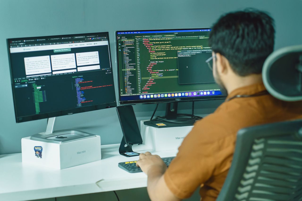 Developer building a website at a computer